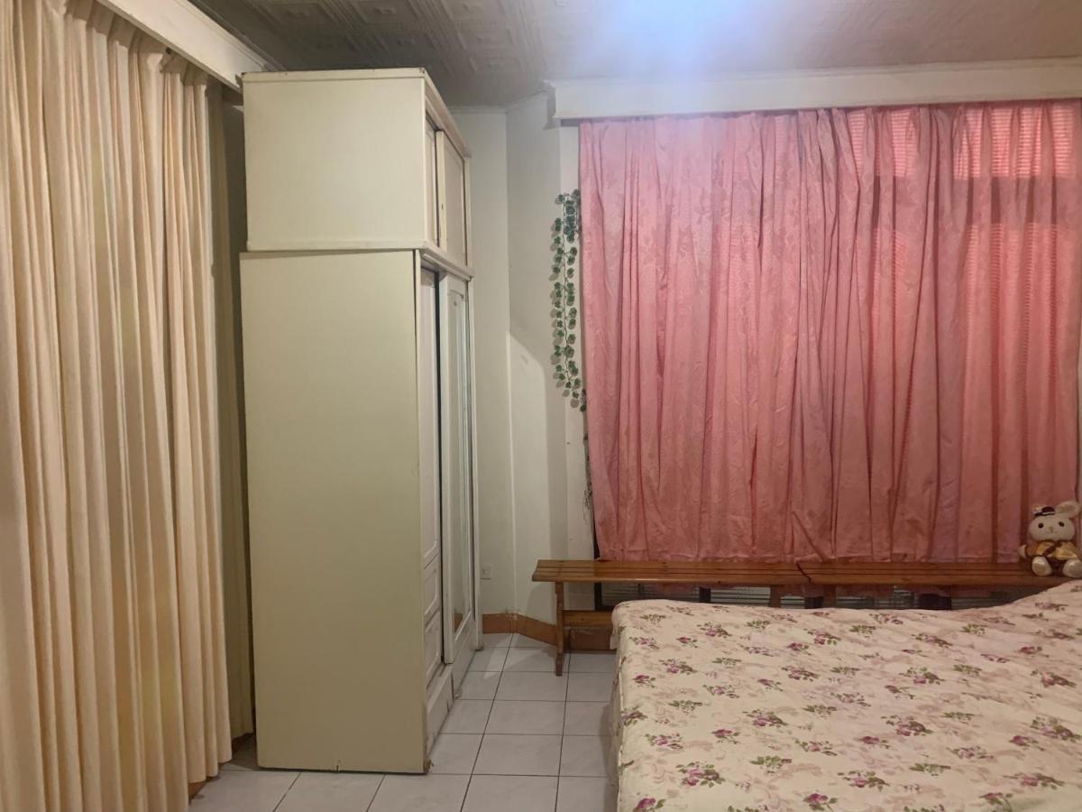 淡水老街歡樂便利民宿 Тамсуи Экстерьер фото